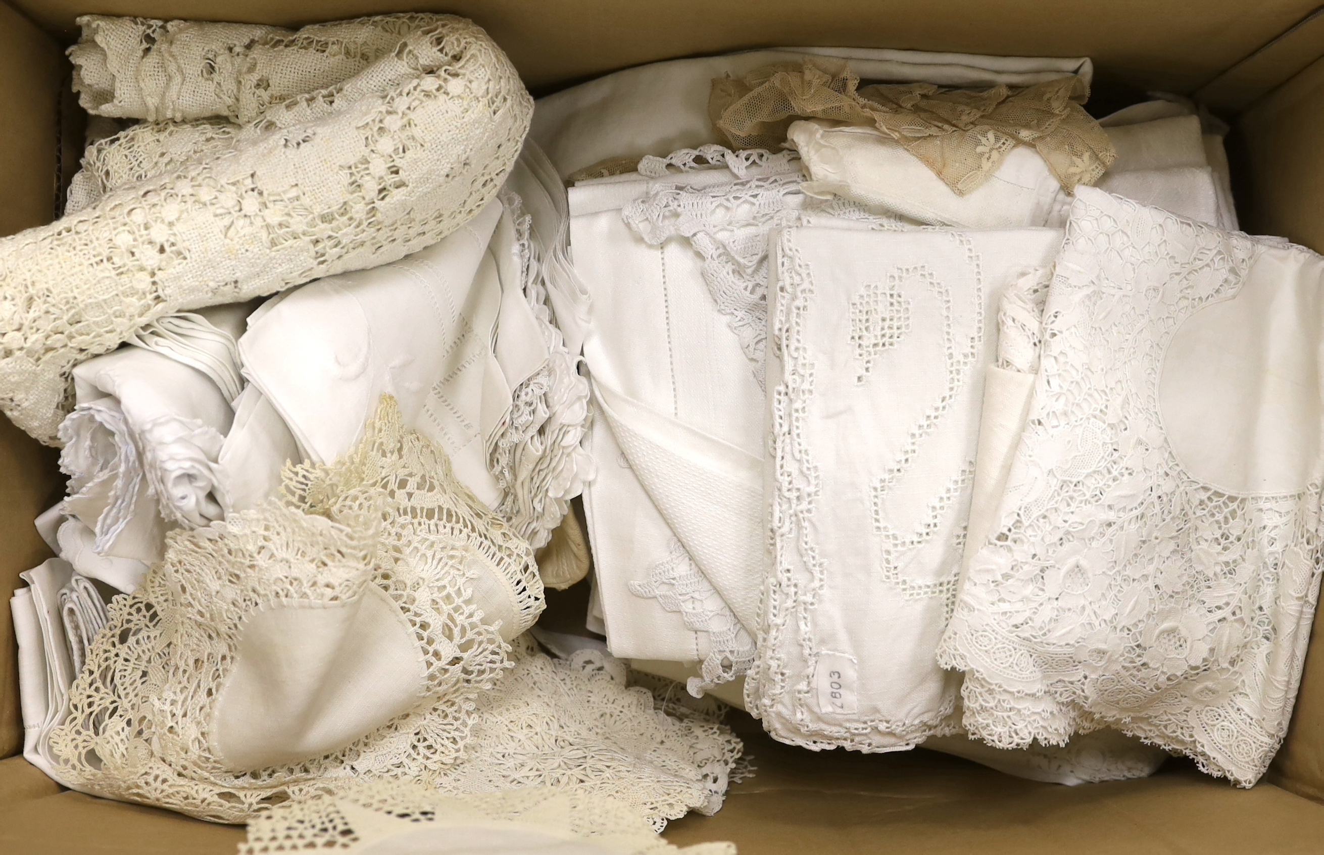 A collection of crochet and other table linen